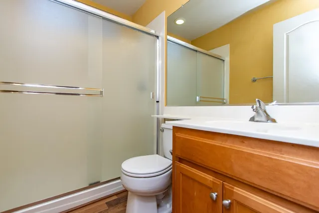 a view of an entryway with wooden floor