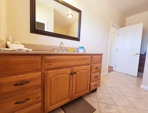 a bathroom with a sink and a shower
