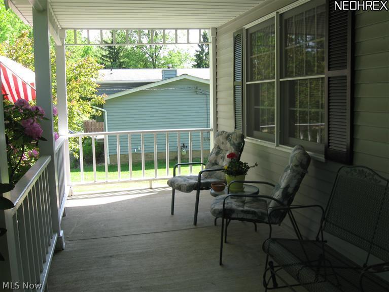 8908 Shepard Road Macedonia, OH 44056 - Photo 2 of 25 Very functional front porch with enough width to fully enjoy it!