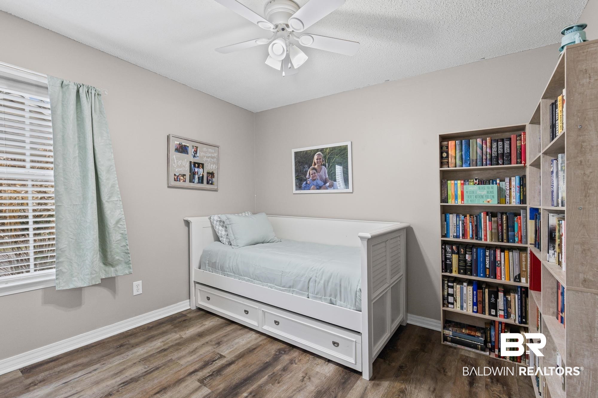 6609 Blakeley Court Mobile, AL 36695 - Photo 18 of 28 Bedroom featuring dark wood-type flooring and ceiling fan