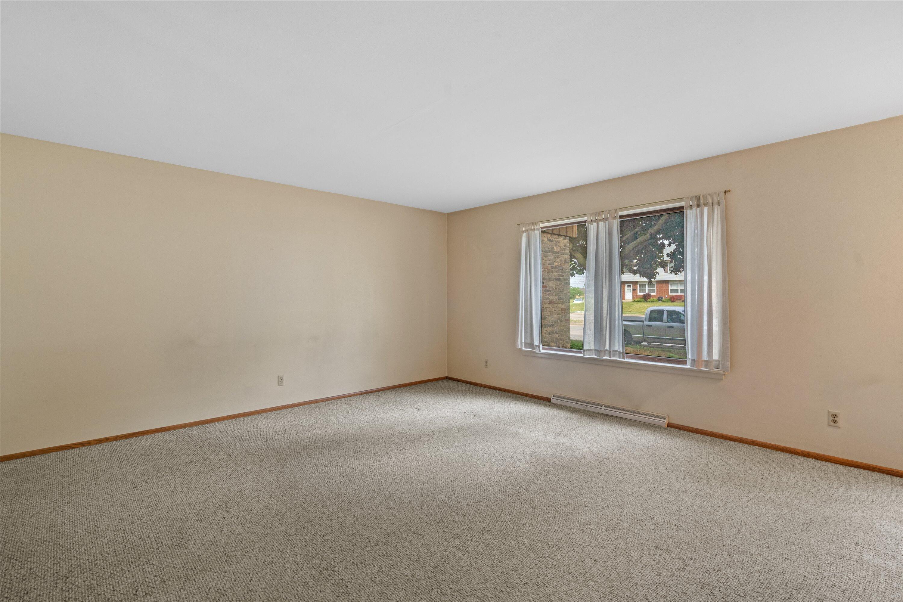 9903 Beloit Road, Unit F10 Milwaukee, WI 53227 - Photo 3 of 30 03-Living Room