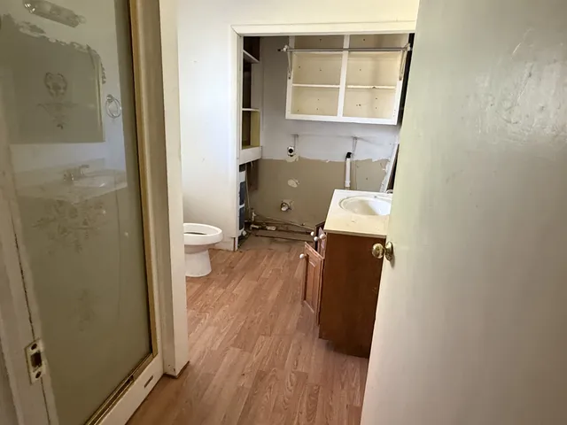 a bathroom with a sink and a toilet