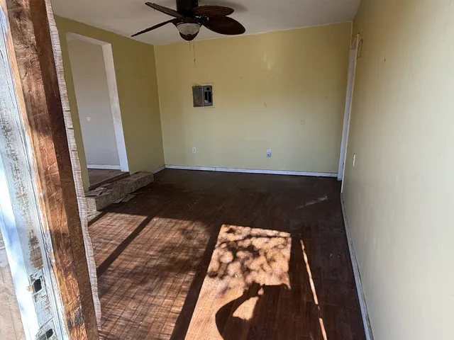 view of a room with a wooden floor