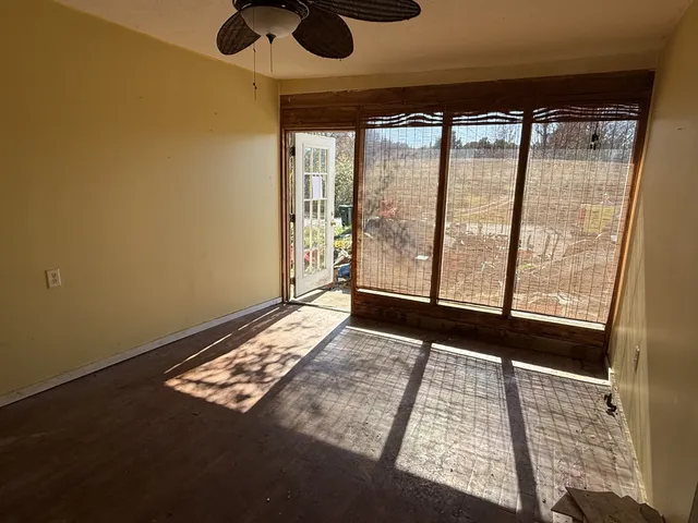 a view of an empty room and window