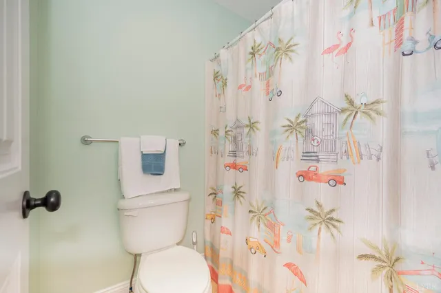 a living room with furniture window and wooden floor