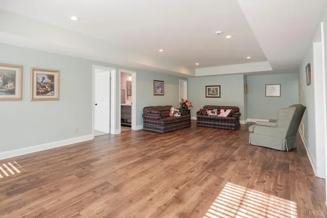 a bathroom with a shower a toilet and a sink