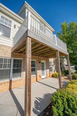 a view of a pathway of a house with wooden floor