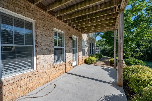 a view of a swimming pool with an outdoor space