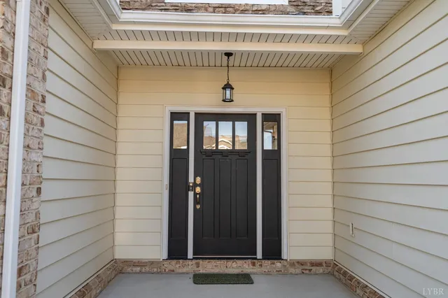 an aerial view of houses with outdoor space