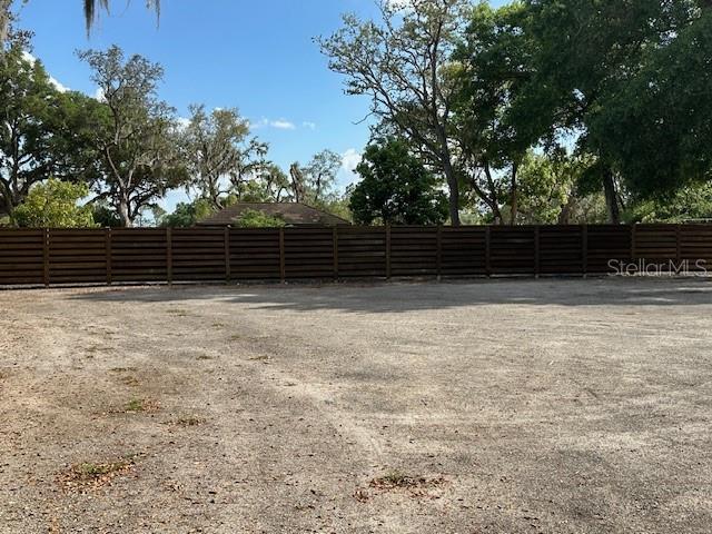 0 Country Club Road Winter Haven, FL 33881 - Photo 6 of 9 a view of outdoor space with deck and trees