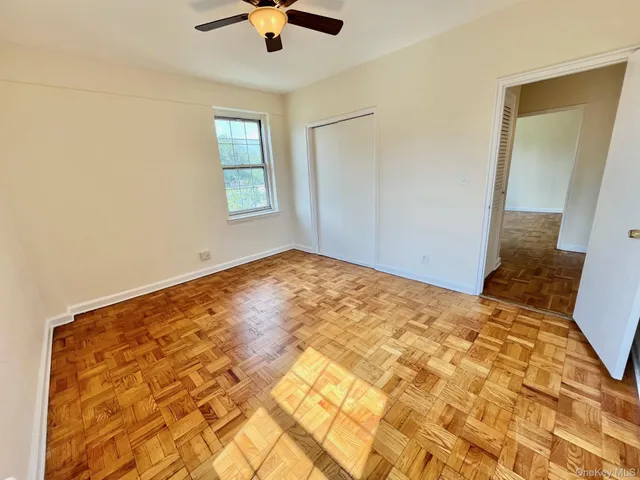 a view of a big room with windows