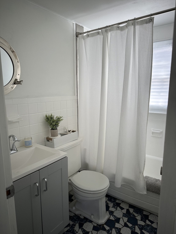 2 Ebb Road Dennis, MA 02660 - Photo 15 of 19 a bathroom with a sink a toilet a shower and a mirror