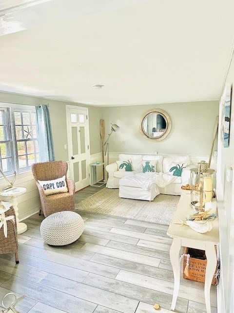 2 Ebb Road Dennis, MA 02660 - Photo 10 of 19 a bedroom with a bed and wooden floor