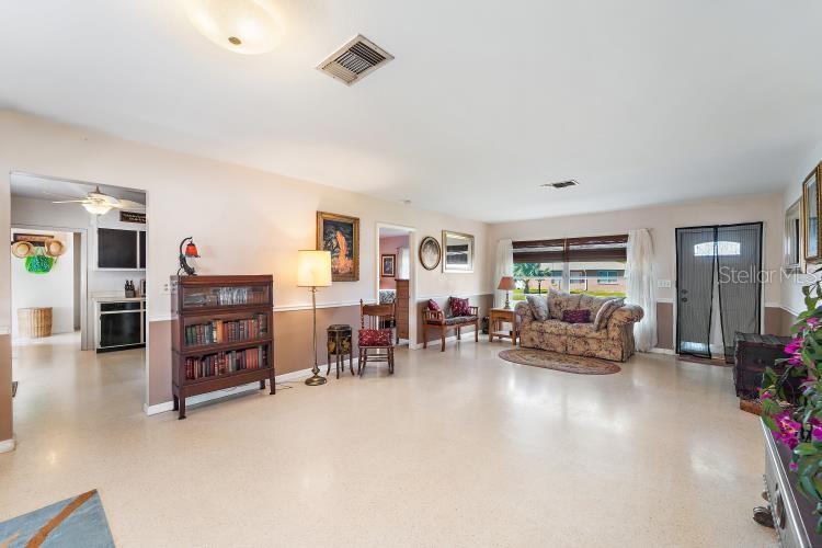 444 Driftwood Road Venice, FL 34293 - Photo 12 of 27 a living room with furniture and wooden floors