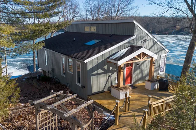 a backyard of a house with seating space
