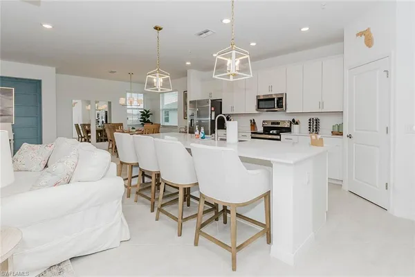 a view of a dining room kitchen and a window