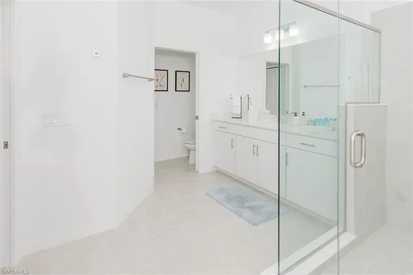 a spacious bathroom with a shower