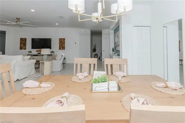 a view of dining table and chairs