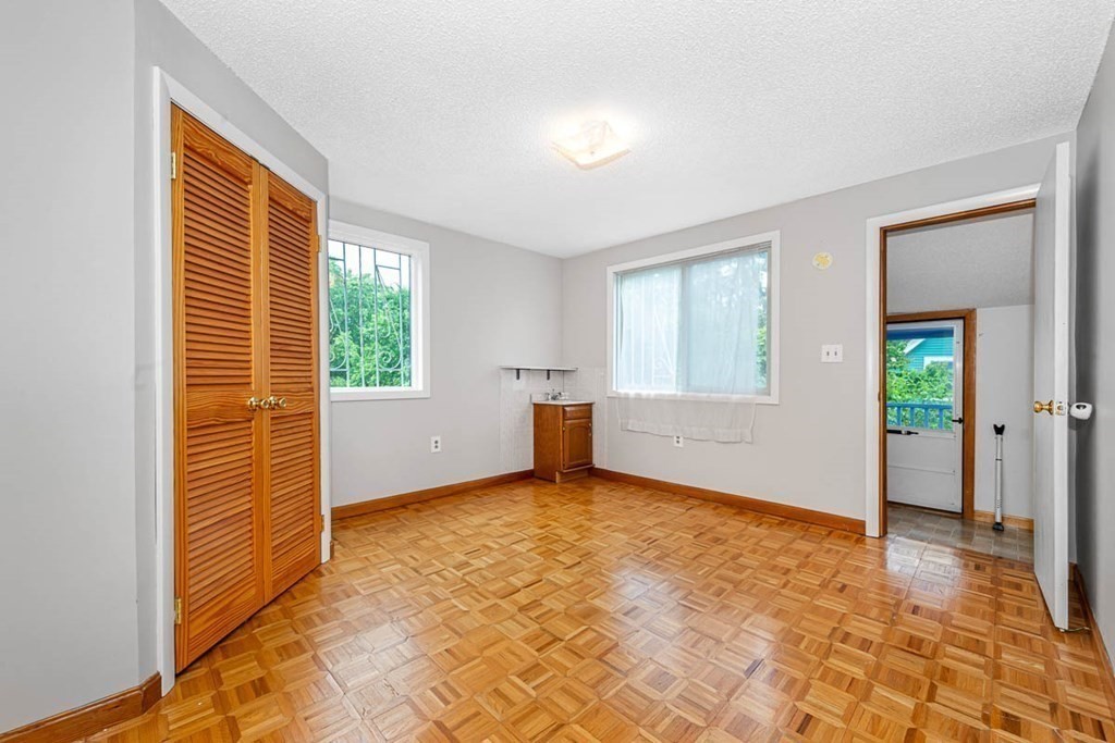 101 Reed Street Cambridge, MA 02140 - Photo 12 of 15 a view of an empty room with a window
