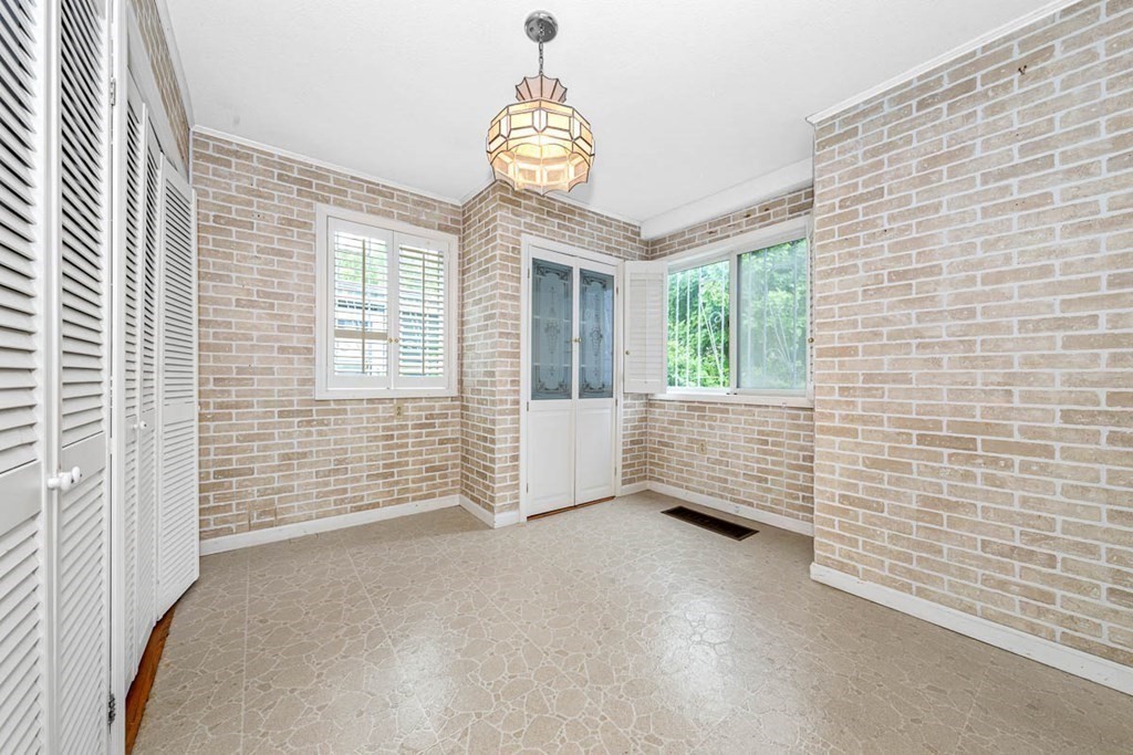 101 Reed Street Cambridge, MA 02140 - Photo 5 of 15 a view of an empty room with a window