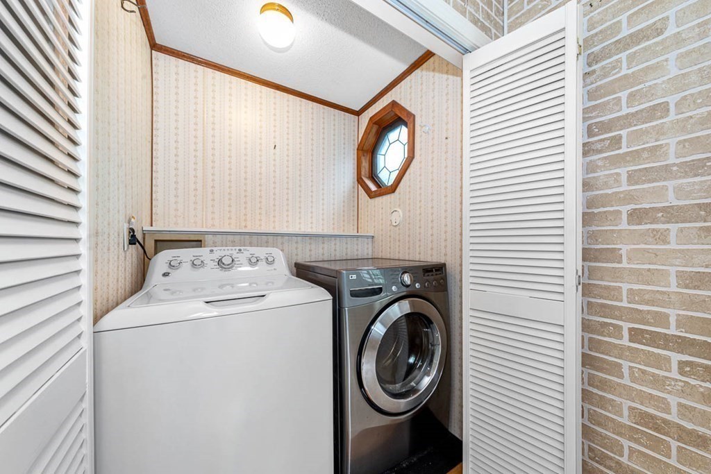 101 Reed Street Cambridge, MA 02140 - Photo 7 of 15 a utility room with dryer and washer