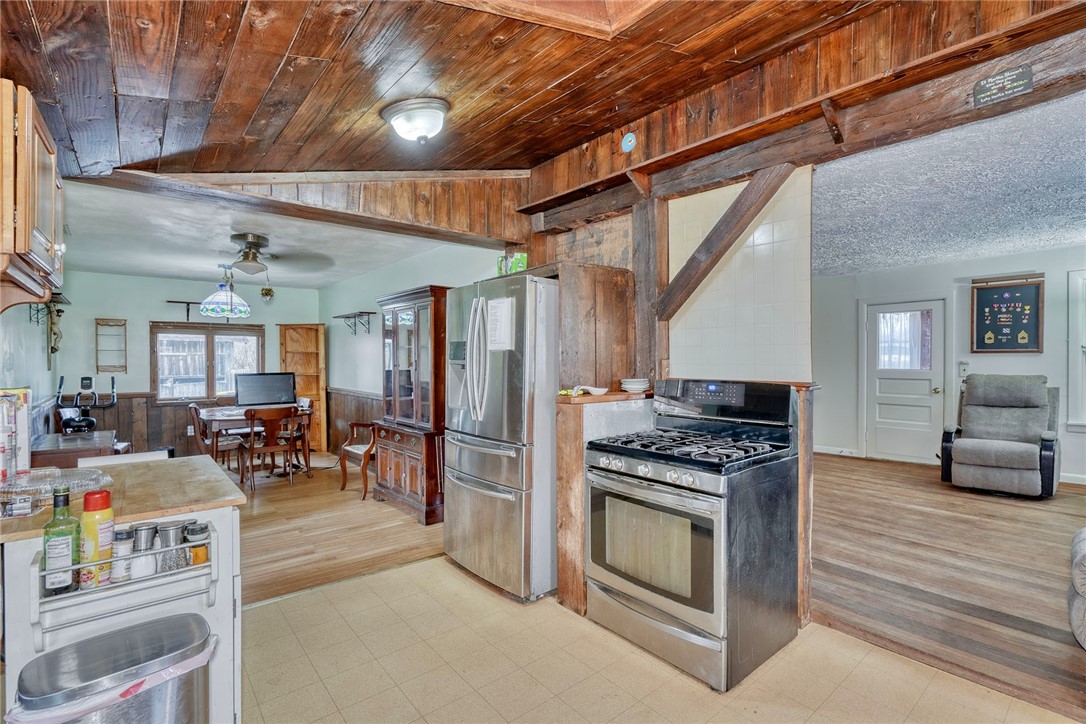 13088 Ridge Road Wolcott, NY 14590 - Photo 11 of 46 KITCHEN OPENS TO FORMAL DINING