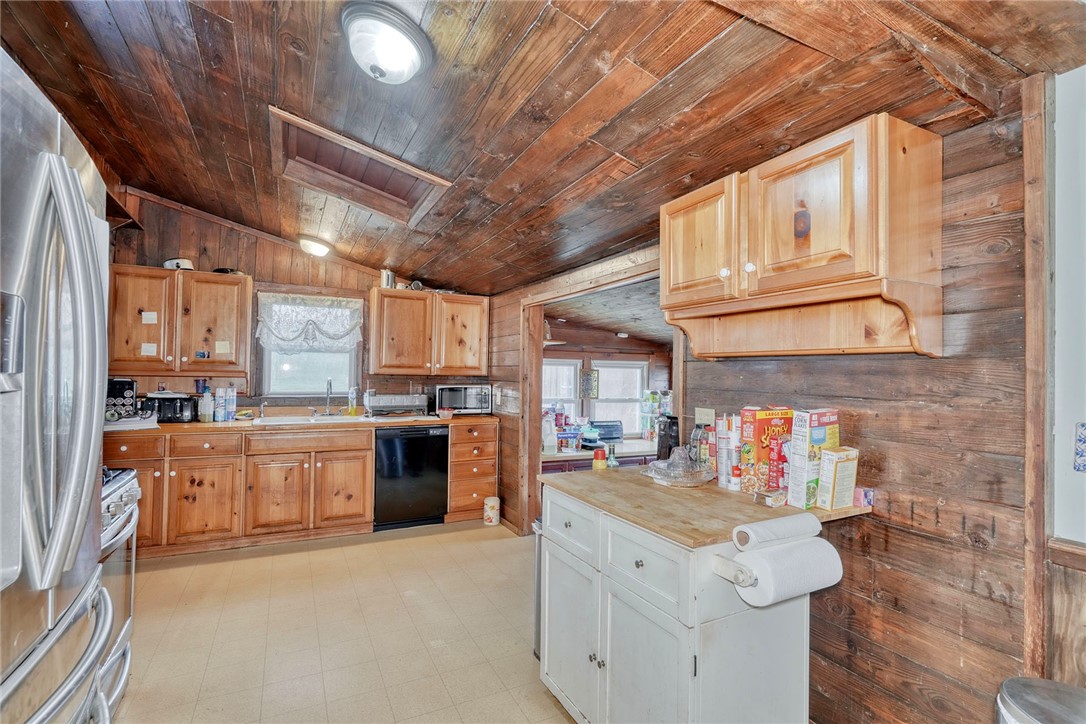 13088 Ridge Road Wolcott, NY 14590 - Photo 9 of 46 KITCHEN WITH BEAUTIFUL VAULTED WOOD CEILING