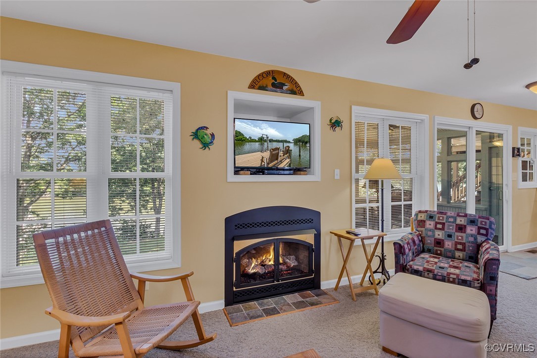 781 Coan Haven Road Lottsburg, VA 22511 - Photo 11 of 50 a living room with furniture and a fireplace