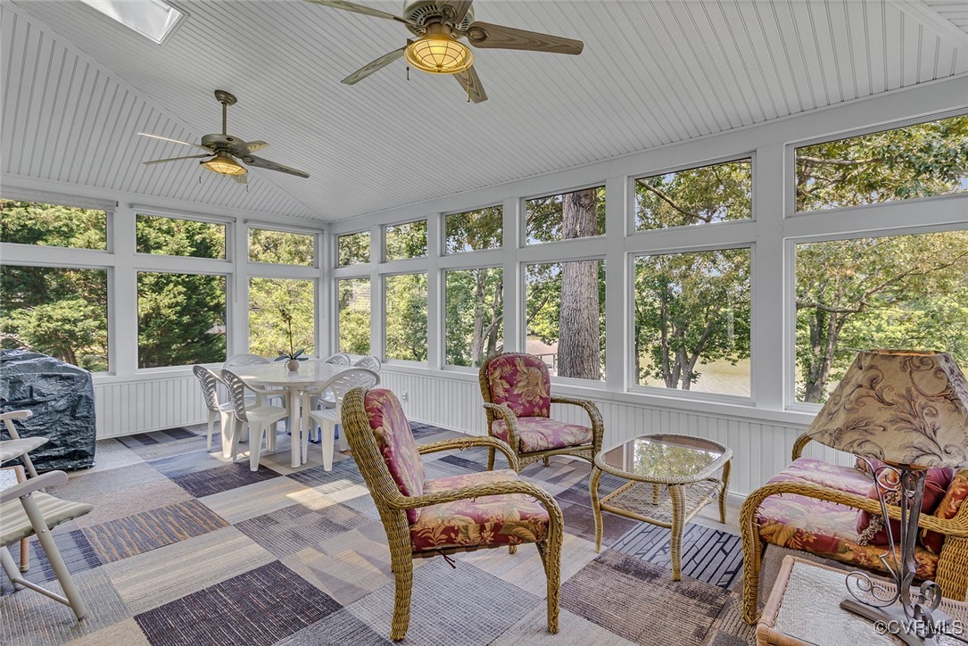781 Coan Haven Road Lottsburg, VA 22511 - Photo 12 of 50 a dining room with furniture a chandelier and wooden floor
