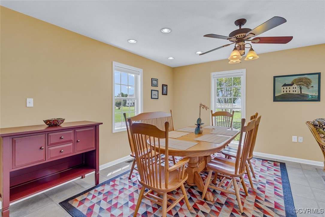 781 Coan Haven Road Lottsburg, VA 22511 - Photo 20 of 50 a view of a dining room with furniture and a chandelier