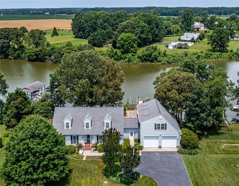 781 Coan Haven Road Lottsburg, VA 22511 - Photo 2 of 50 an aerial view of a house with a yard and lake view