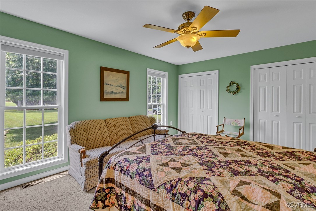 781 Coan Haven Road Lottsburg, VA 22511 - Photo 23 of 50 a bedroom with a bed and a window