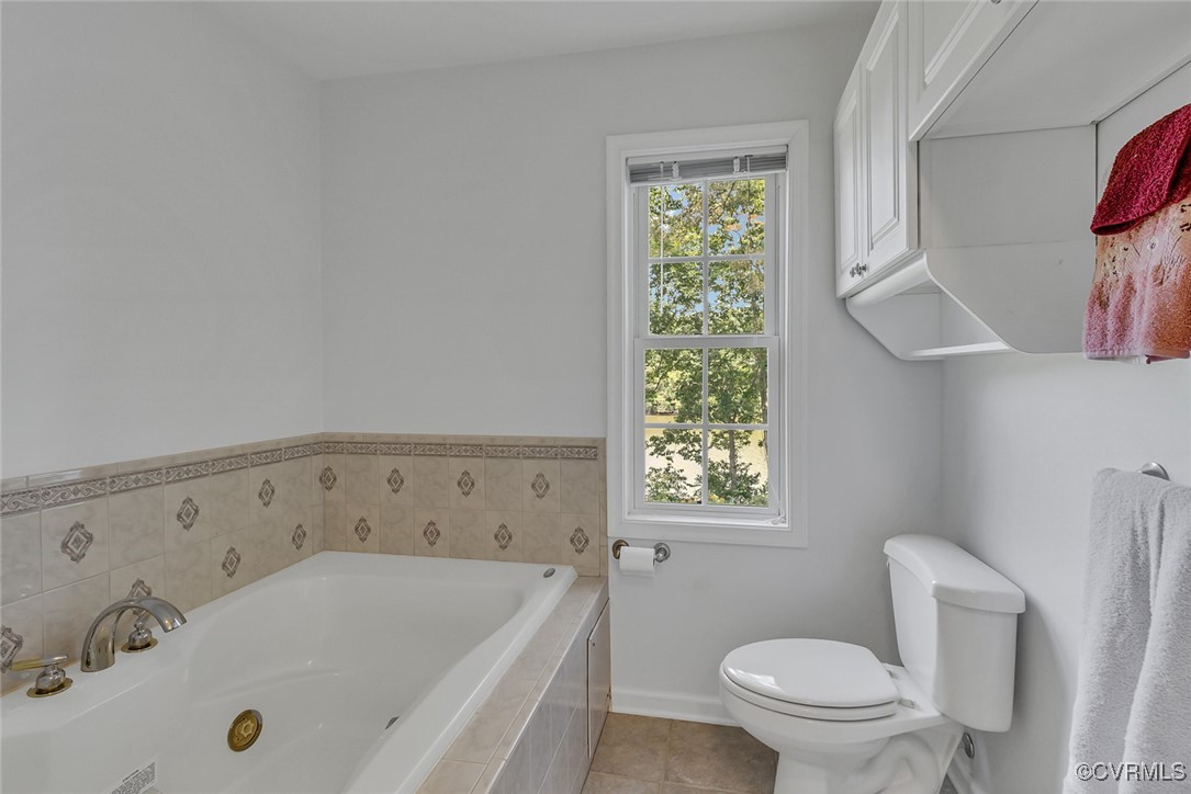 781 Coan Haven Road Lottsburg, VA 22511 - Photo 26 of 50 a bathroom with a bathtub and a toilet