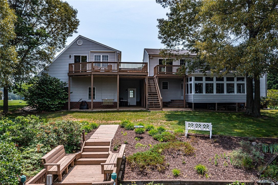 781 Coan Haven Road Lottsburg, VA 22511 - Photo 43 of 50 a front view of a house with garden