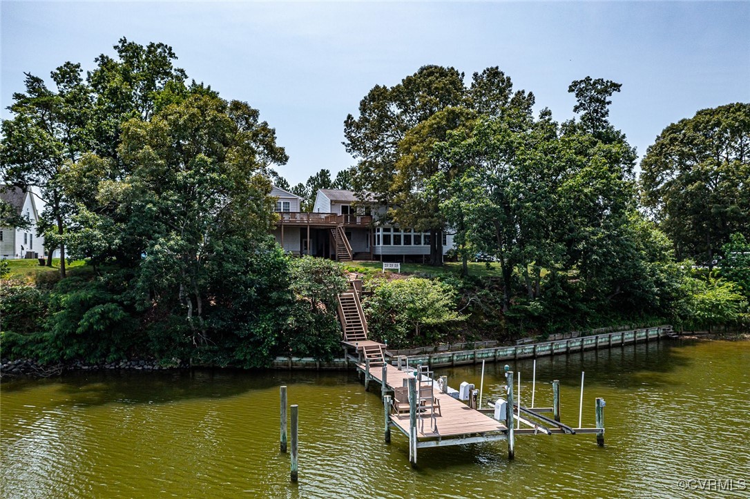 781 Coan Haven Road Lottsburg, VA 22511 - Photo 50 of 50 a view of a lake with a house in the background