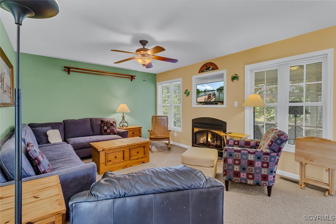 781 Coan Haven Road Lottsburg, VA 22511 - Photo 8 of 50 a living room with furniture and a fireplace
