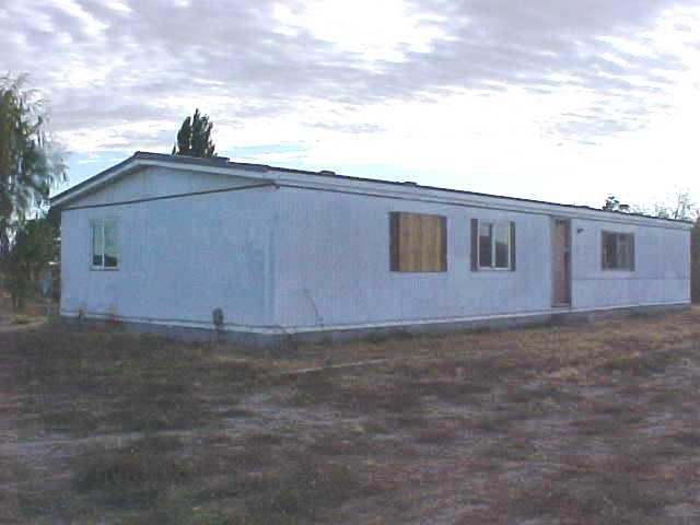 410 Randel Road Sunnyside, WA 98944 - Photo 1 of 1 a backyard of a house