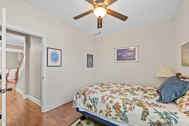 a large kitchen with kitchen island a sink a stove a refrigerator and island