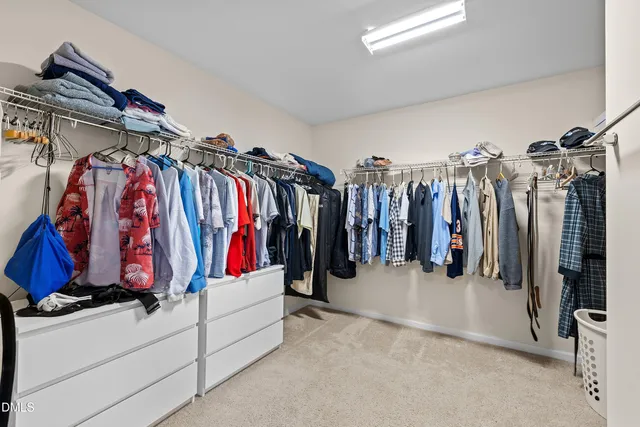 a view of multiple houses with a swimming pool