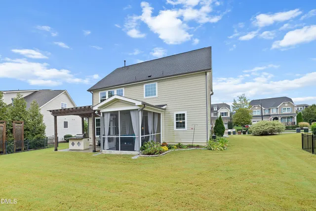 an aerial view of a house with outdoor space lake view and lake view