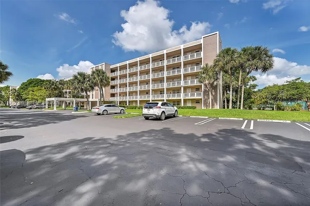 a building with trees in front of it