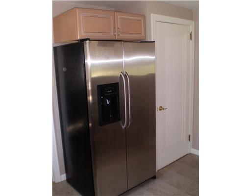 118 Leon Road Green Tree, PA 15220 - Photo 5 of 18 Kitchen. Refrigerator has icemaker and water line. Door to the right leads to basement.