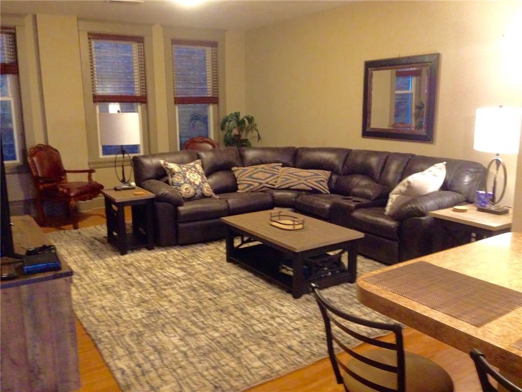 115 West Jefferson Street Butler, PA 16001 - Photo 20 of 30 a living room with furniture ceiling fan and a rug