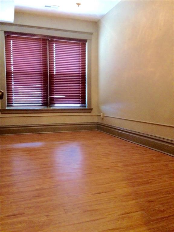 115 West Jefferson Street Butler, PA 16001 - Photo 27 of 30 a view of a room with wooden floor and windows