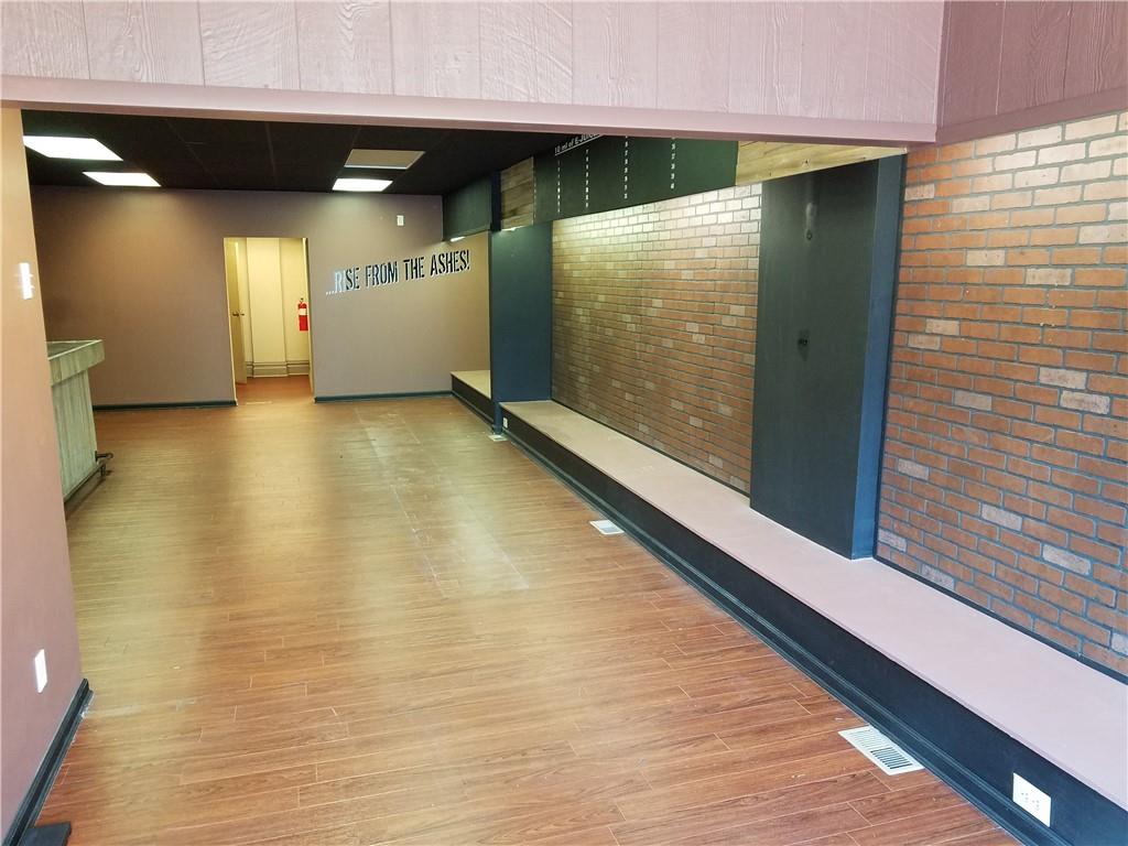 115 West Jefferson Street Butler, PA 16001 - Photo 10 of 30 a view of a hallway with wooden floor