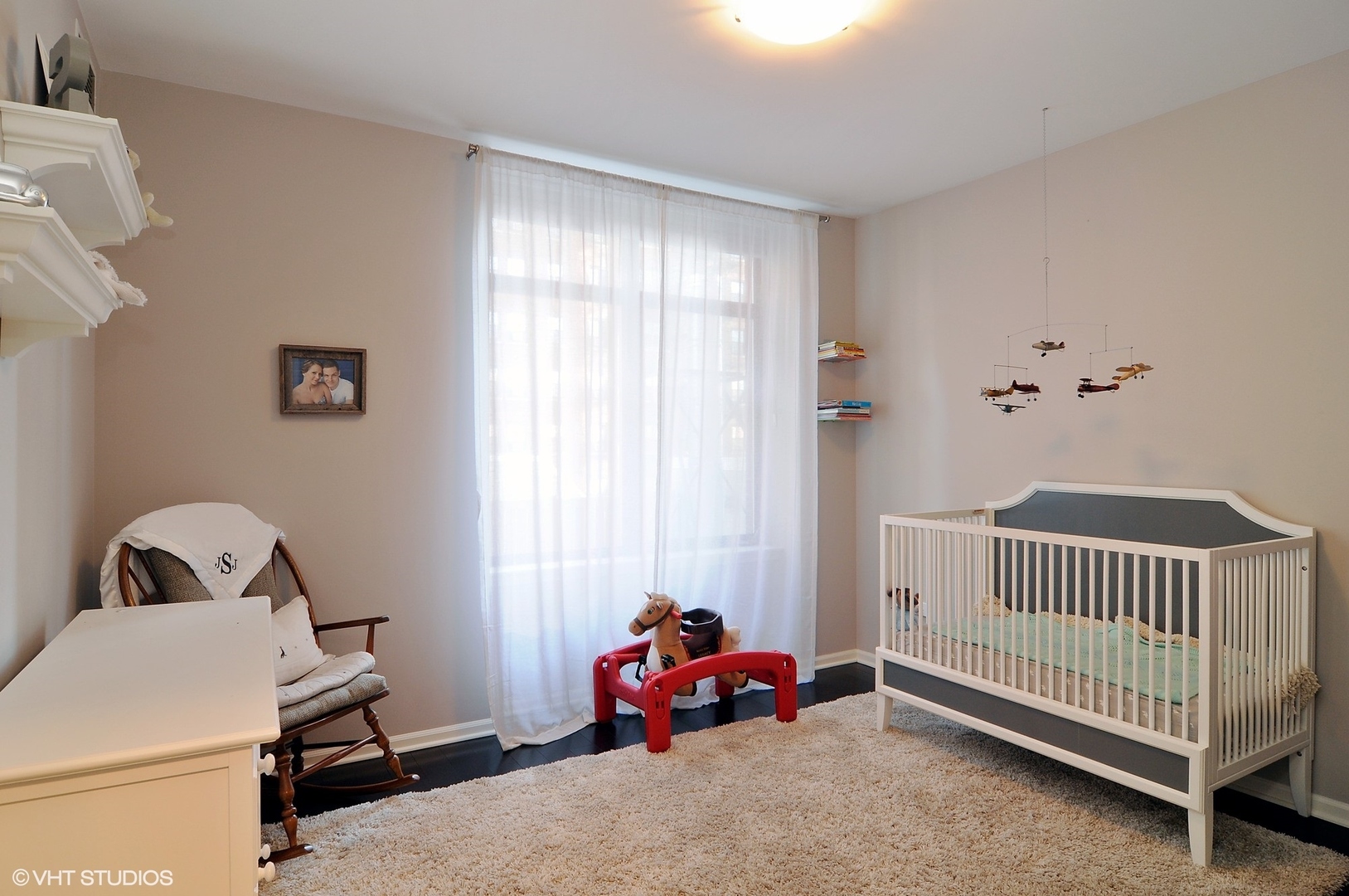 1122 North Dearborn Street, Unit 7A Chicago, IL 60610 - Photo 14 of 25 a bedroom with bed and a window