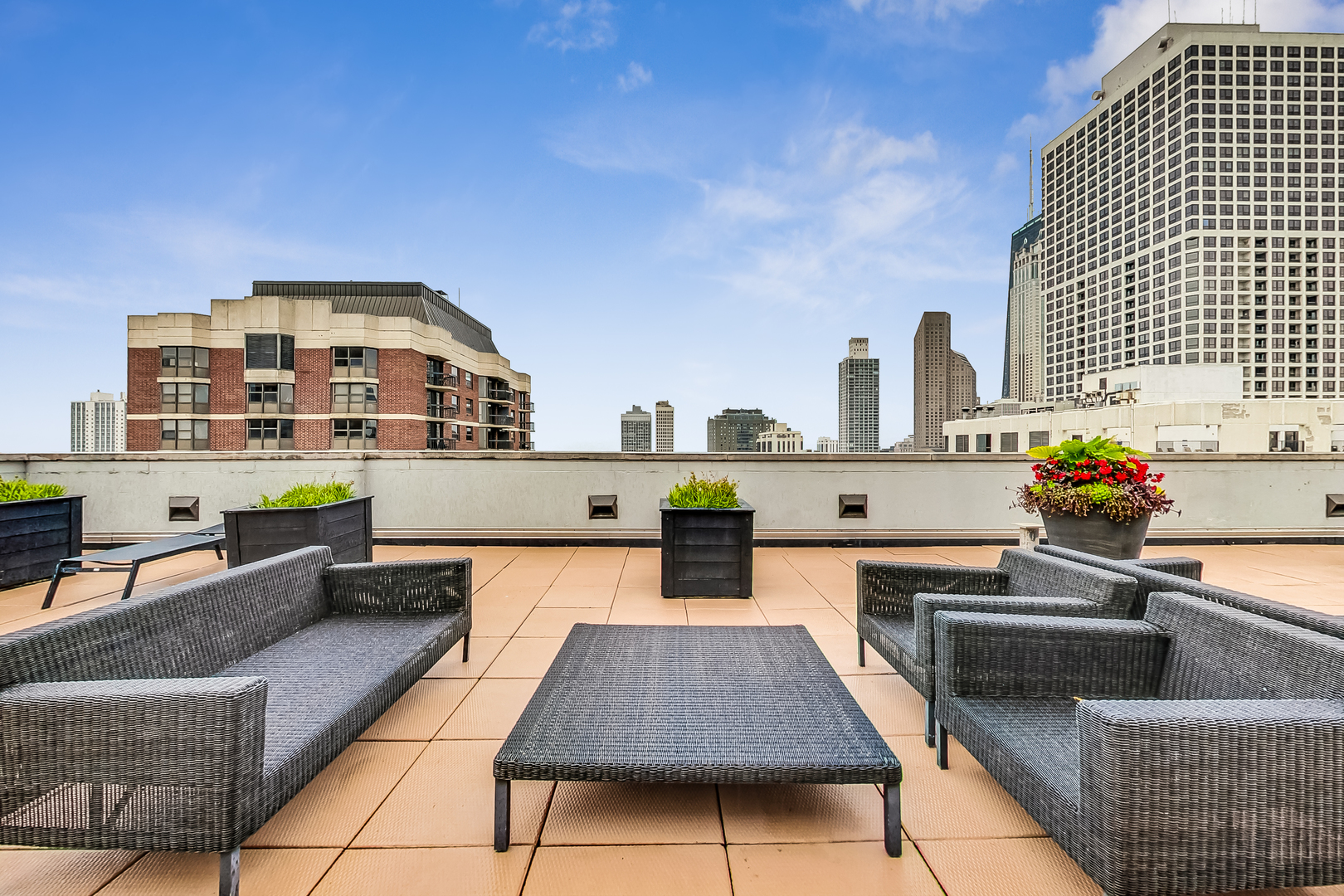 1122 North Dearborn Street, Unit 7A Chicago, IL 60610 - Photo 18 of 25 a terrace of a house with outdoor seating