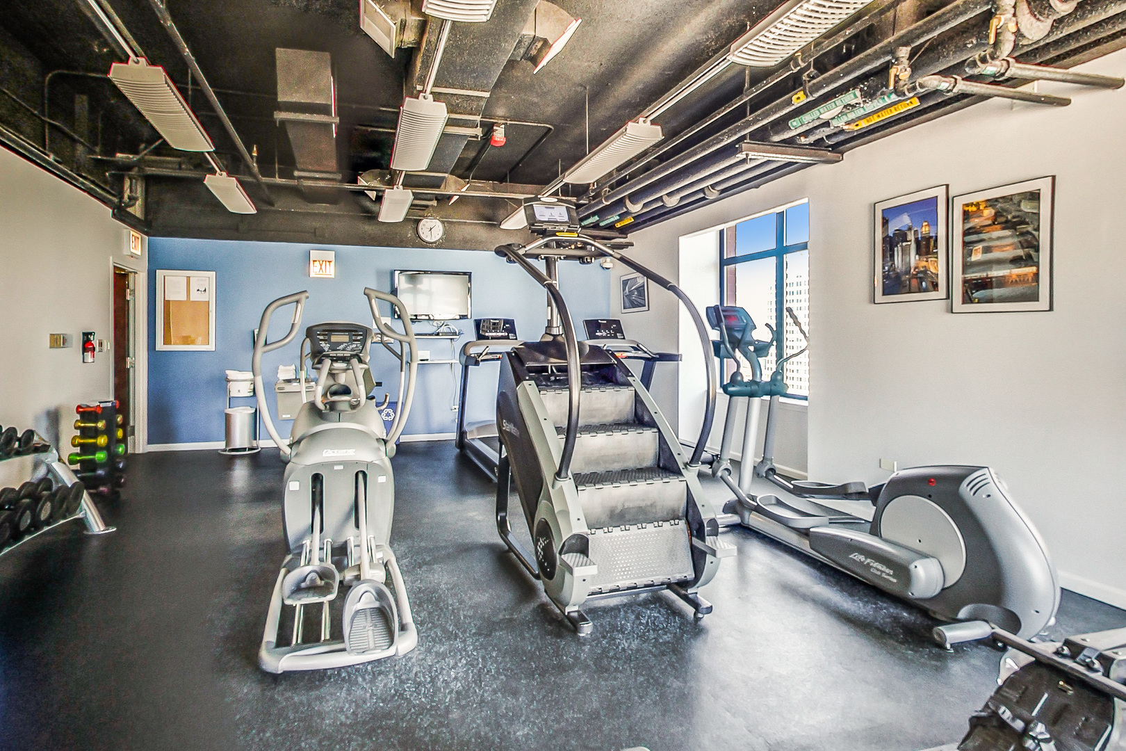 1122 North Dearborn Street, Unit 7A Chicago, IL 60610 - Photo 23 of 25 a view of a room with gym equipment