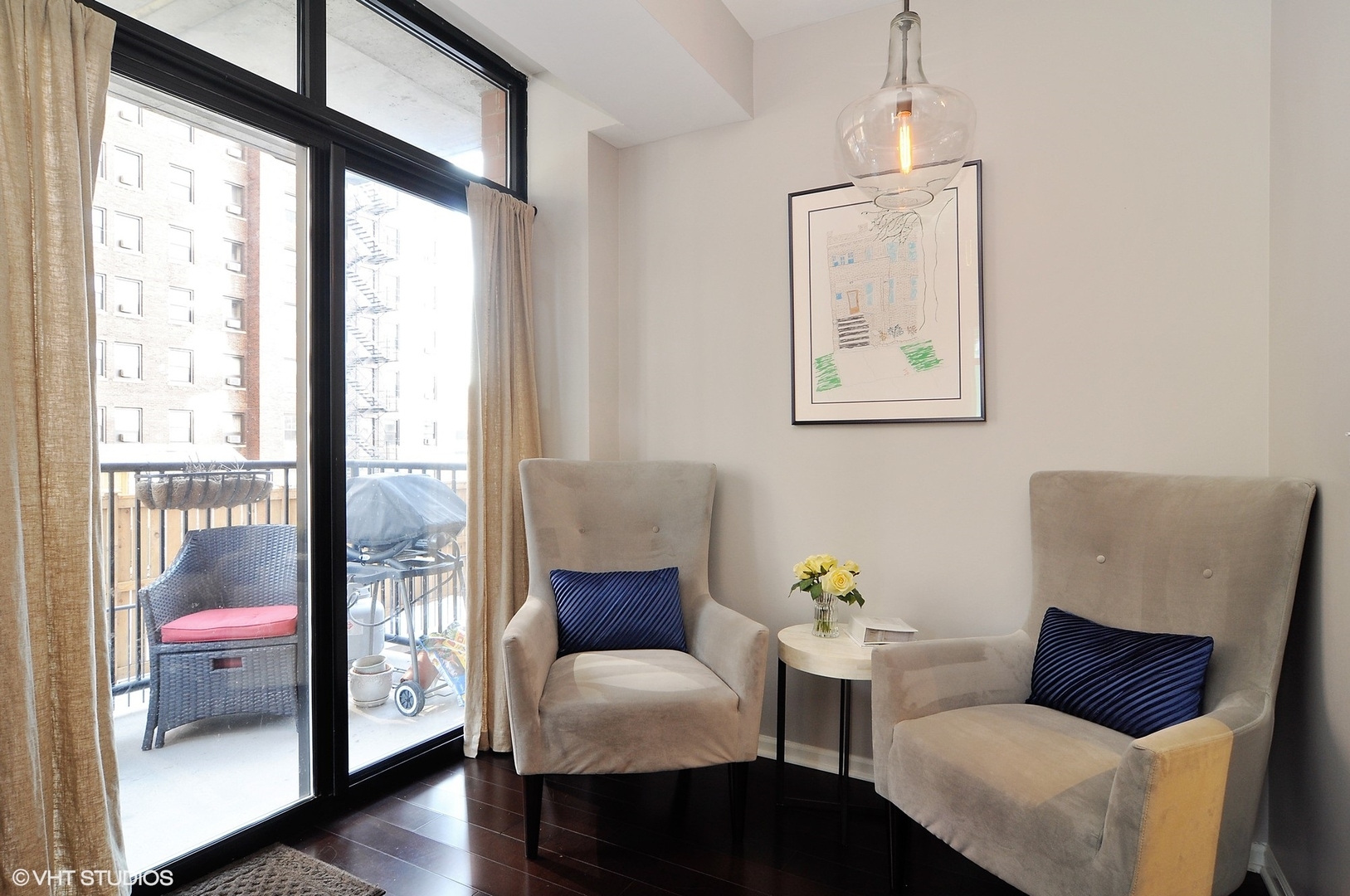 1122 North Dearborn Street, Unit 7A Chicago, IL 60610 - Photo 9 of 25 a living room with furniture and a window