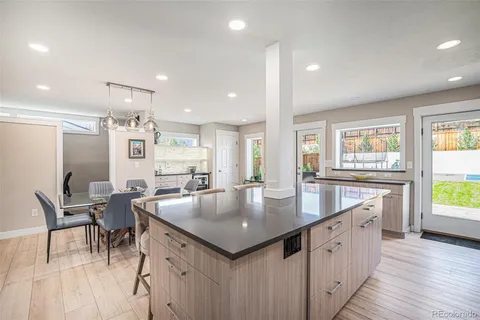 a kitchen with sink and window